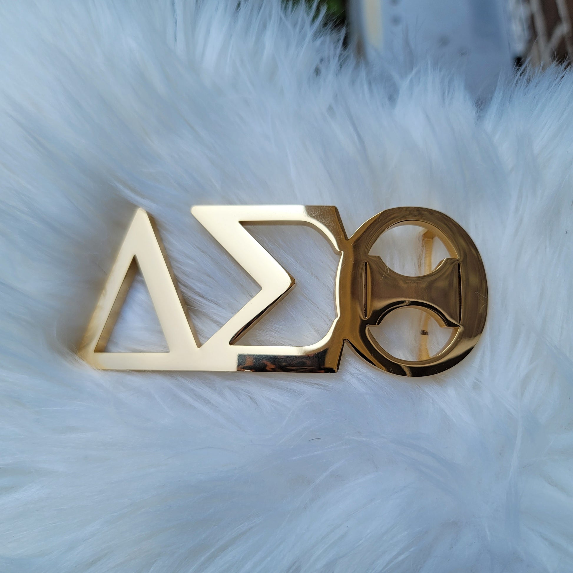 Sorority Greek letter belt Made from quality material, the buckle will not tarnish nor fade Material: stainless steel (with belt buckle only, belt not included) height 1.575 inche, width 4.6 inches. The weight of the buckle is approximately 1lb.