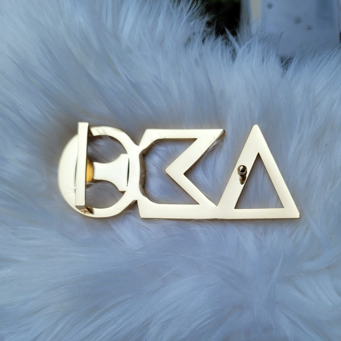 Sorority Greek letter belt Made from quality material, the buckle will not tarnish nor fade Material: stainless steel (with belt buckle only, belt not included) height 1.575 inche, width 4.6 inches. The weight of the buckle is approximately 1lb.