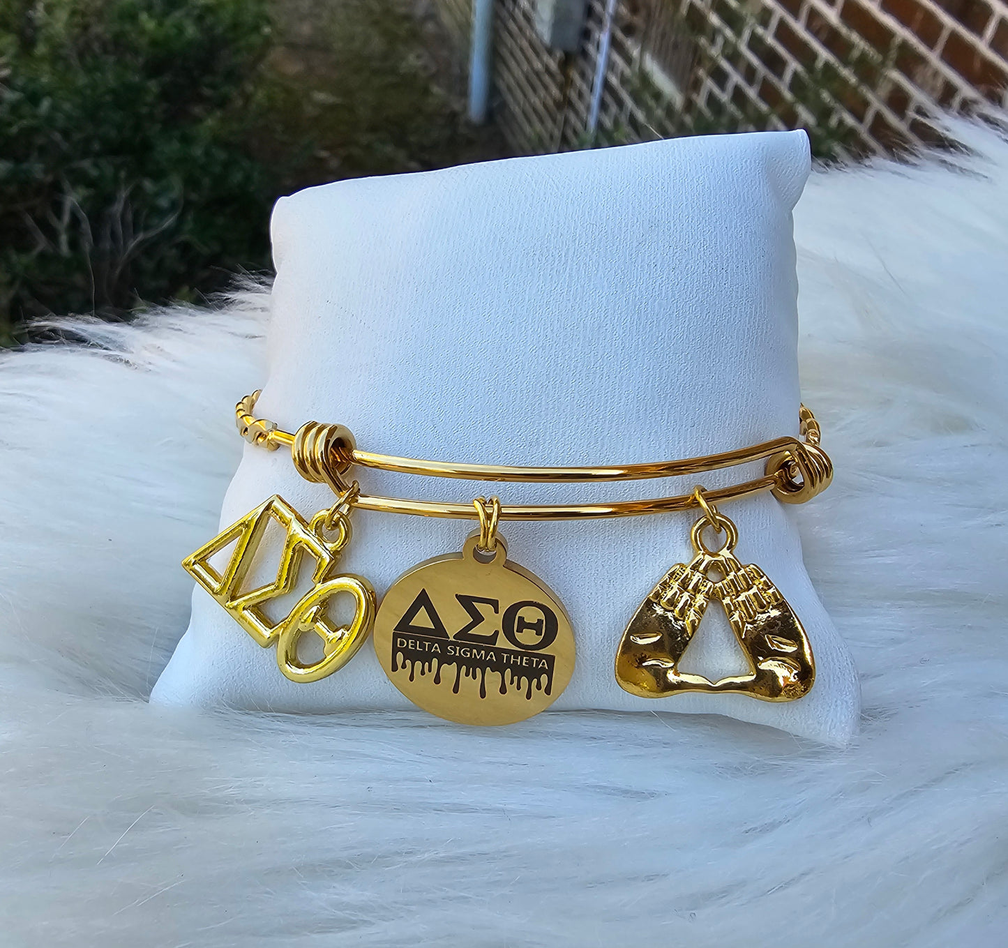 Delta Charm Bracelet Available in Gold and Silver