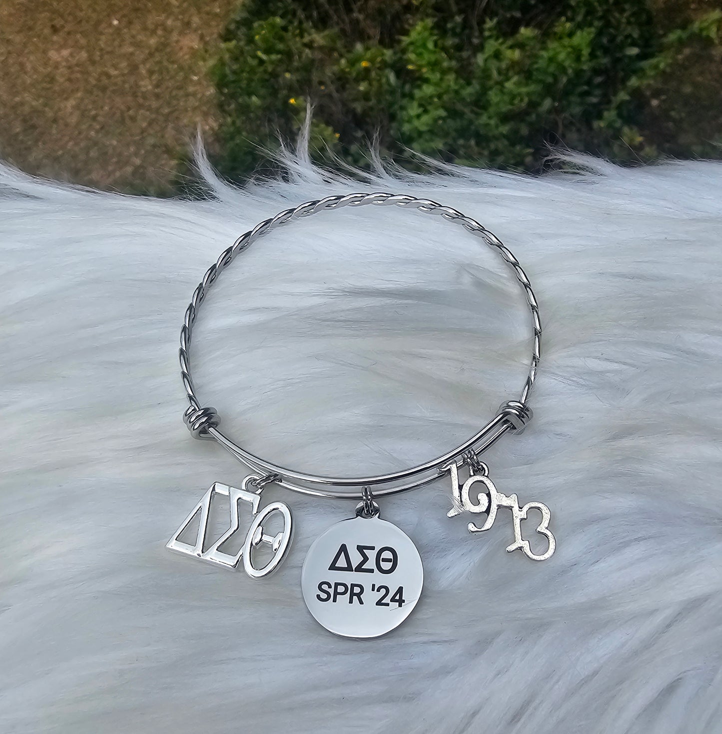 Delta Sigma Theta Spring 2024 Charm Bracelet Available in Gold and Silver