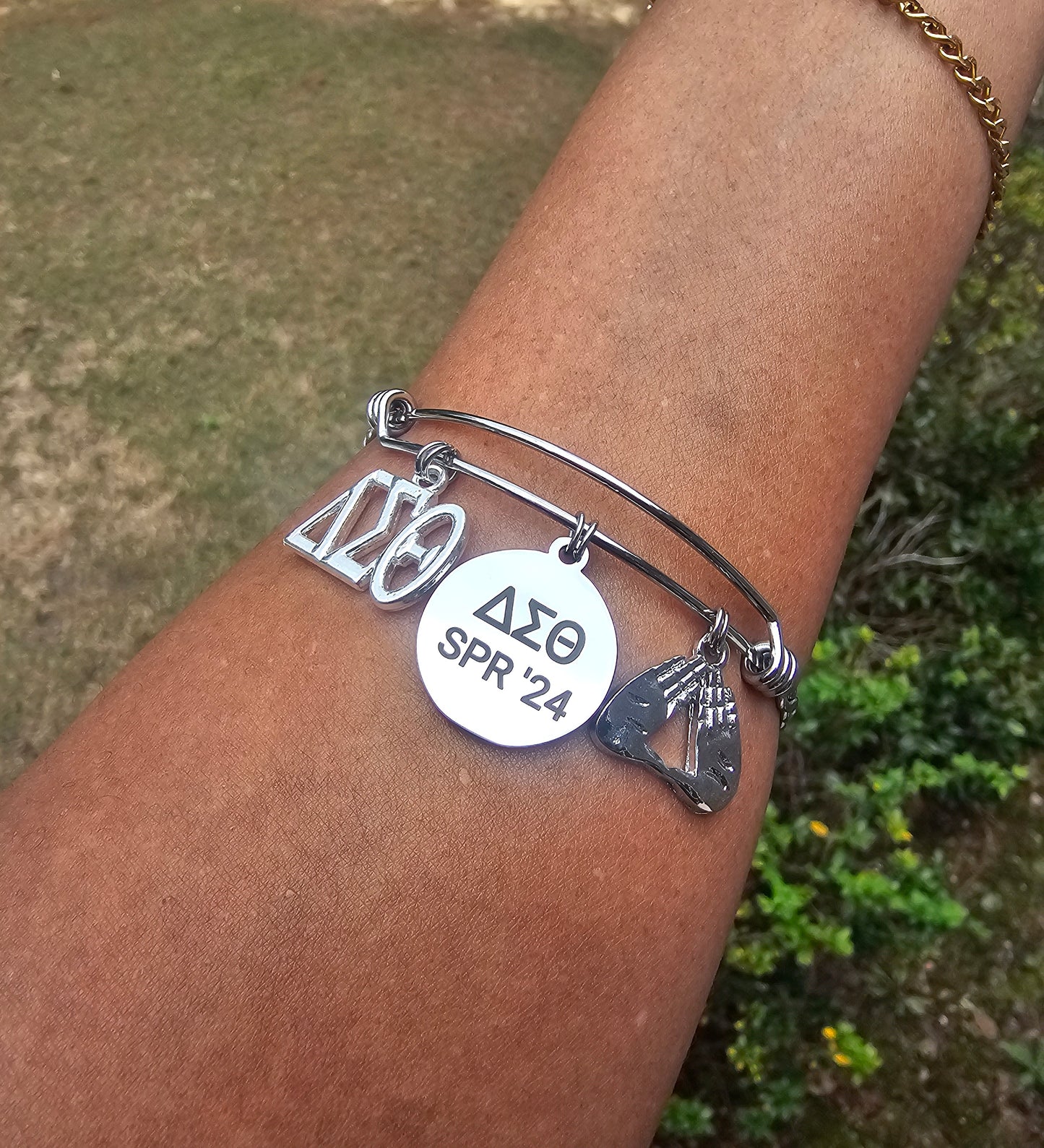 Delta Sigma Theta Spring 2024 Charm Bracelet Available in Gold and Silver