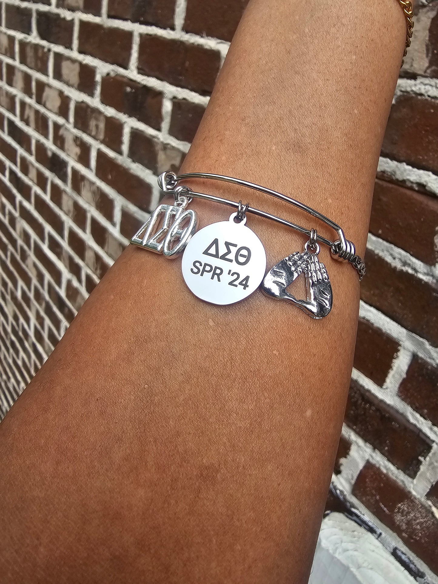 Delta Sigma Theta Spring 2024 Charm Bracelet Available in Gold and Silver